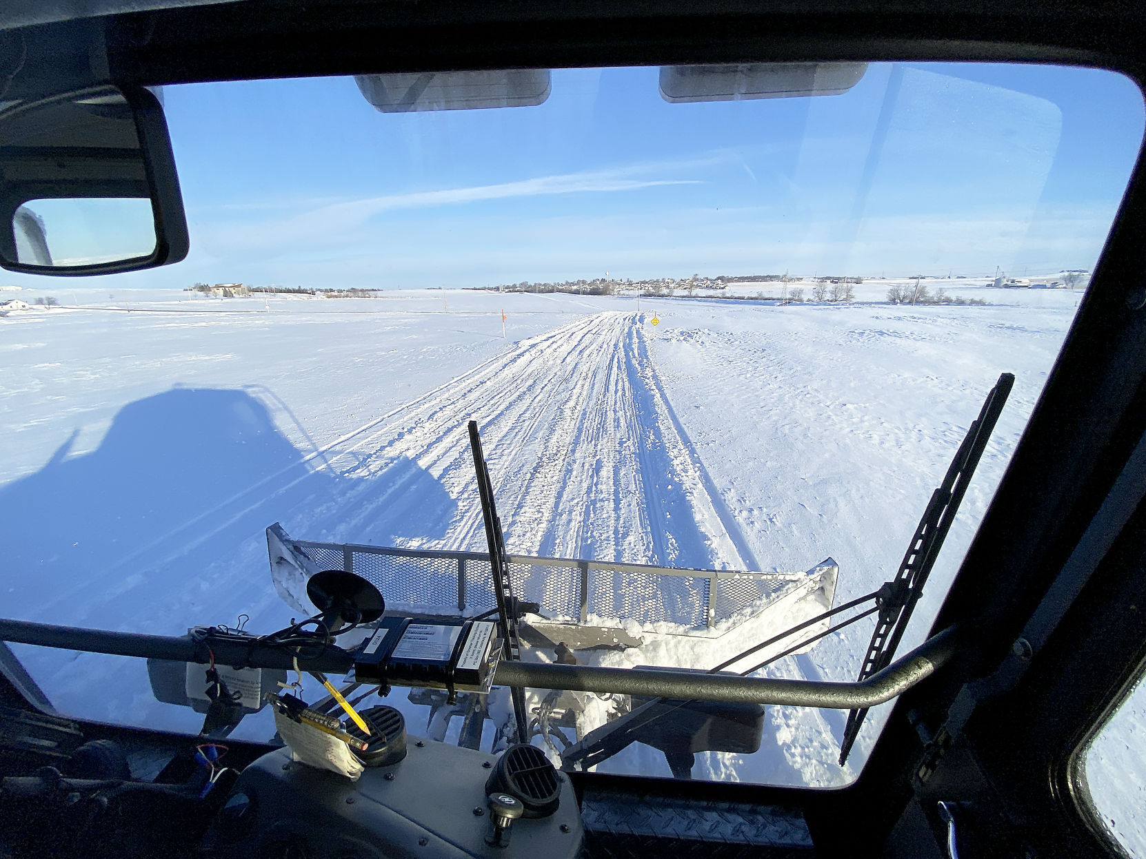 Grooming the snowmobile trail
